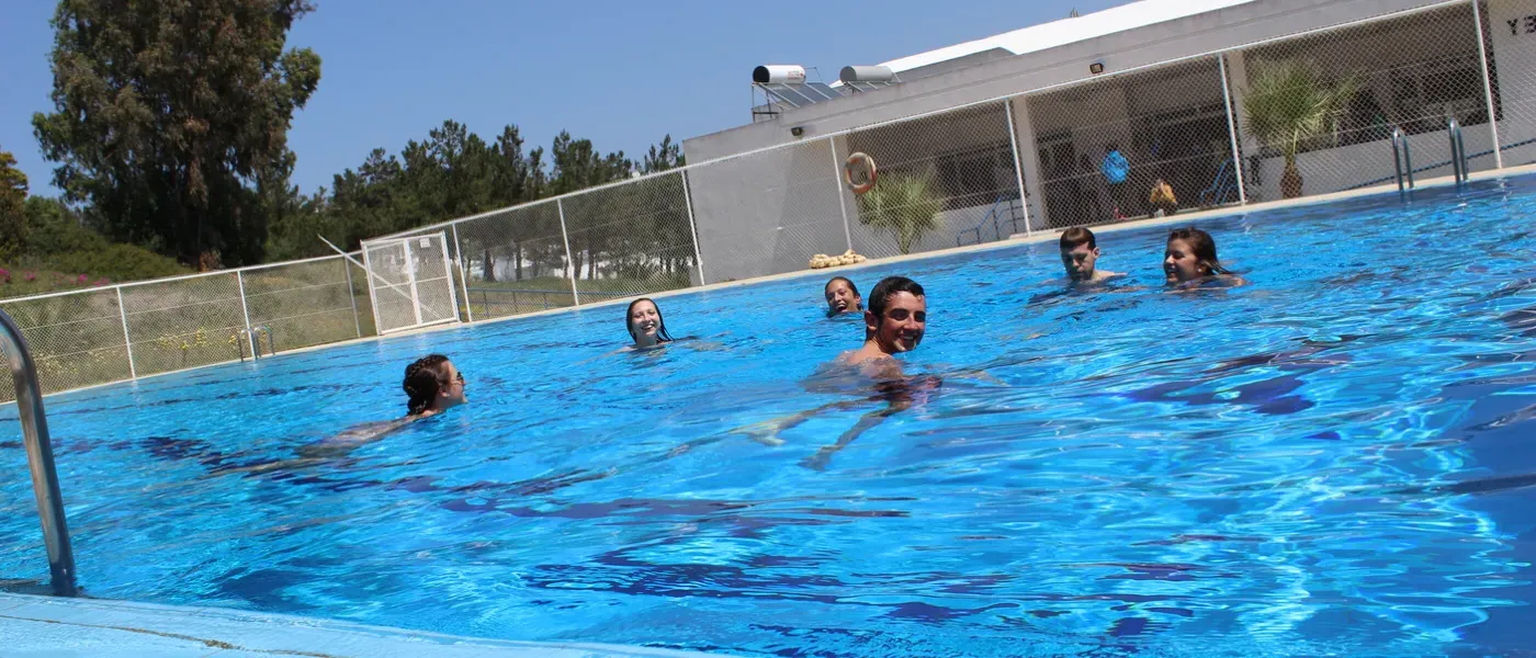 UNE Students swimming at the pool at the American School of Tangier